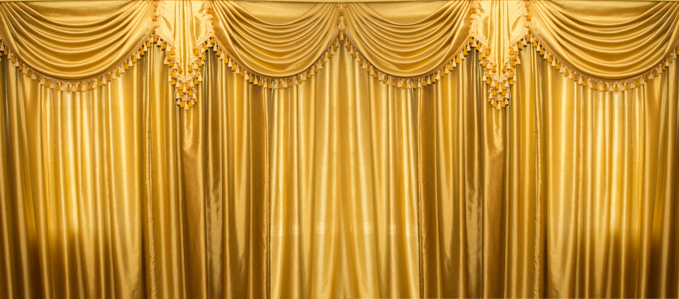 Gold curtains on stage